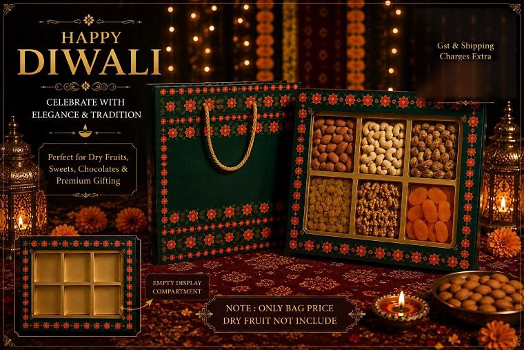 Dark hamper box with compartments for dry fruits, beside a display tray